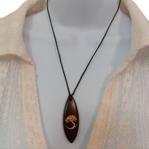 Elegant Black and Gold Toned Wooden Pendant Necklace